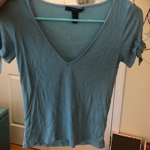 Cuute blue v neck shirt with bows